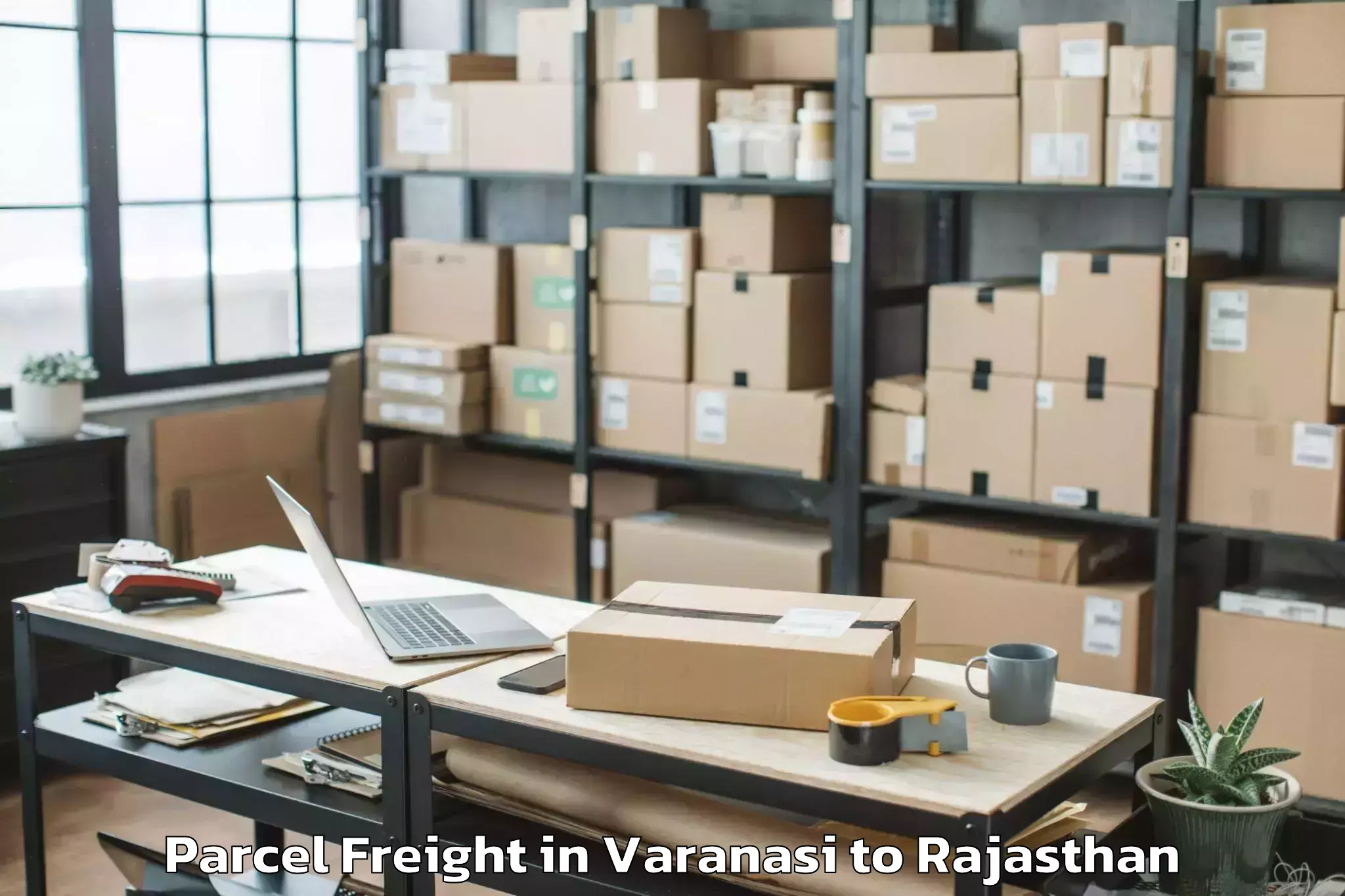 Easy Varanasi to Sagwara Parcel Freight Booking